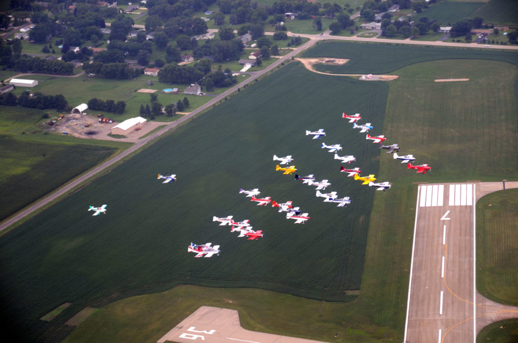 RVs flying in formation over airport