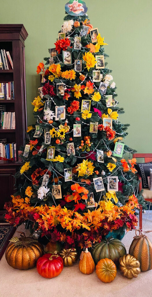 Christmas tree decorated with squirrels and fall flowers