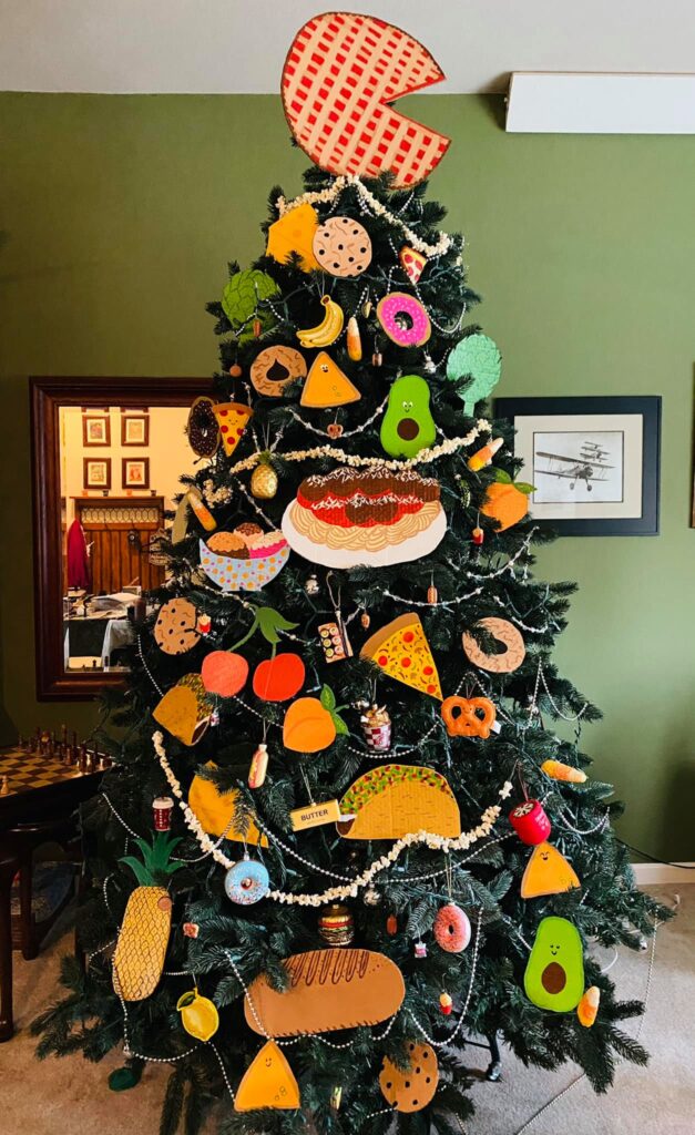 Christmas tree covered with food paintings